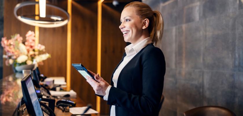 Altitude Transportation & Hospitality — Hotel concierge with mobile device